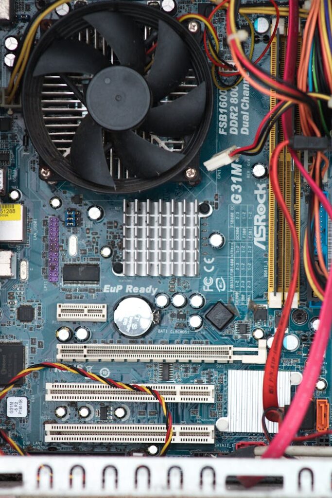 pexels photo 18296921 Detailed photo of a computer's internal components and wiring.