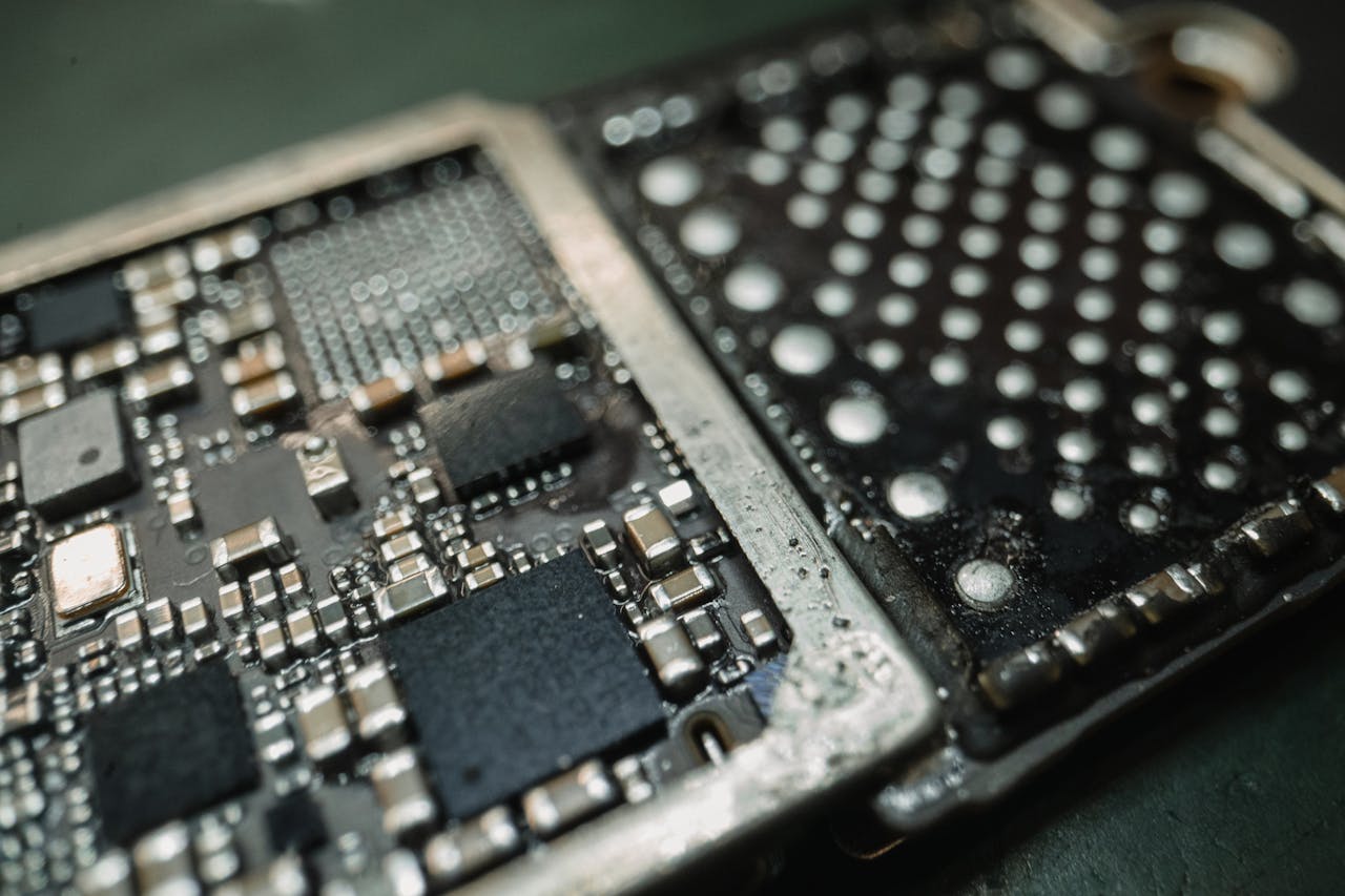 ours-journey Detailed macro shot of an electronic circuit board revealing intricate components.